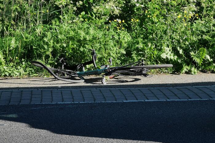 Ongeval tussen scooter en wielrenner