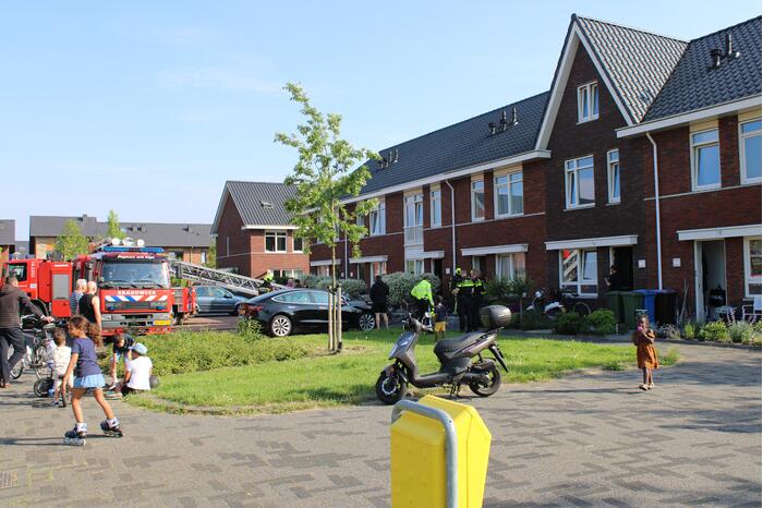 Brandweer blust vermoedelijke brand in gevel