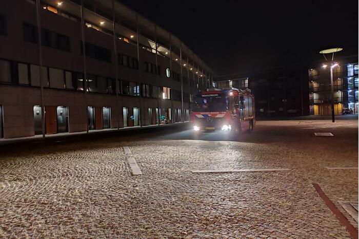 Karton vat vlam tegen woning