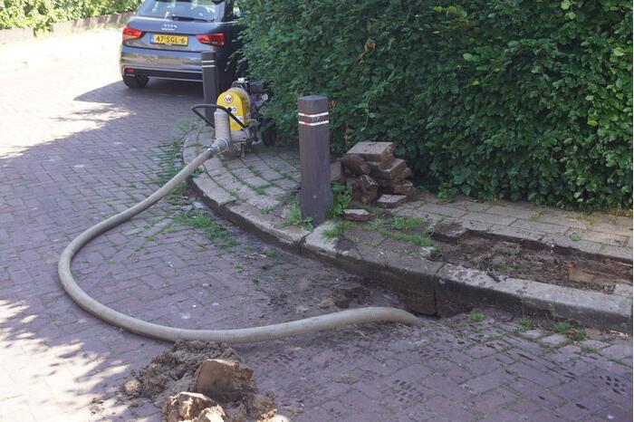 Stoep opengebroken door waterlekkage