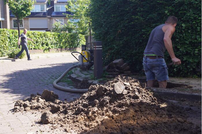 Stoep opengebroken door waterlekkage