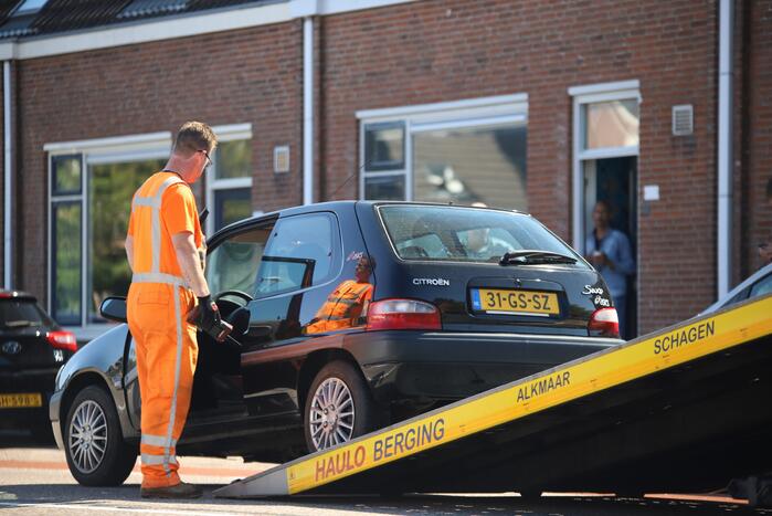Schade bij aanrijding tussen twee auto's