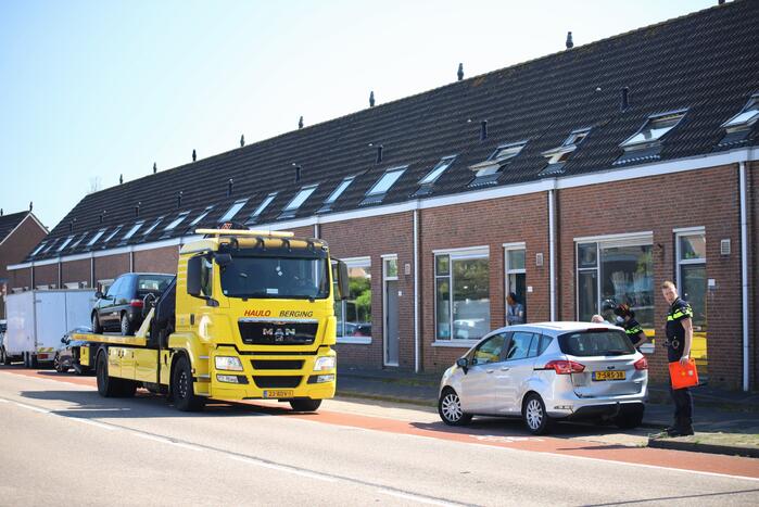 Schade bij aanrijding tussen twee auto's