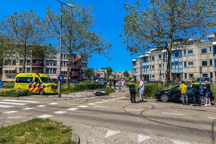 Scooter aangereden door personenauto