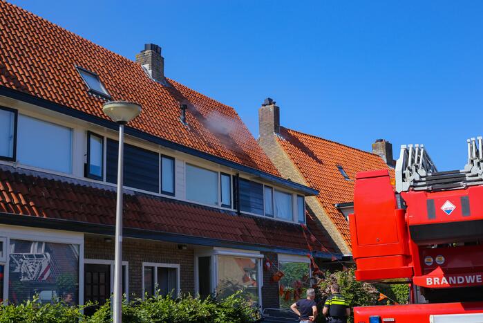 Grijze rookontwikkeling brand in woning