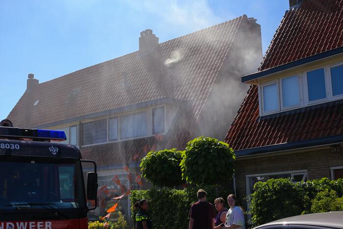 Grijze rookontwikkeling brand in woning