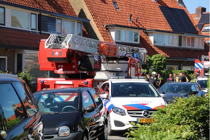 Grijze rookontwikkeling brand in woning