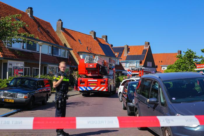 Grijze rookontwikkeling brand in woning