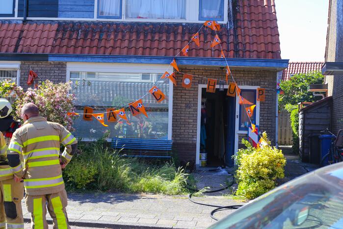 Grijze rookontwikkeling brand in woning