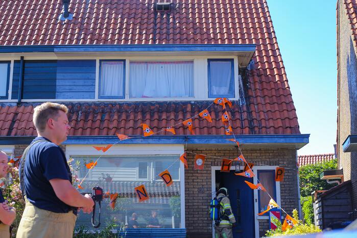 Grijze rookontwikkeling brand in woning