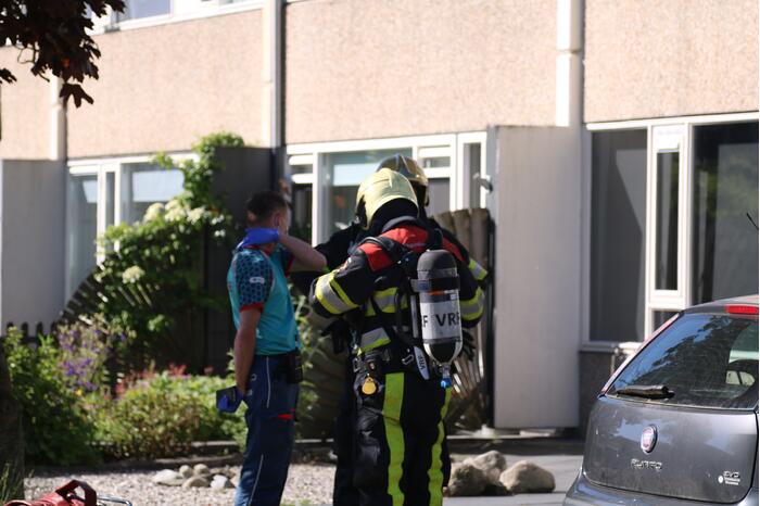 Flinke rookwolken bij brand in keuken