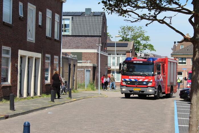 Brand in woning boven winkelpand