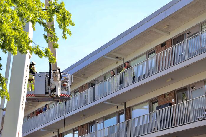 Brand op derde verdieping in flatwoning