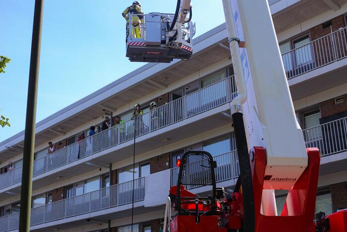 Brand op derde verdieping in flatwoning