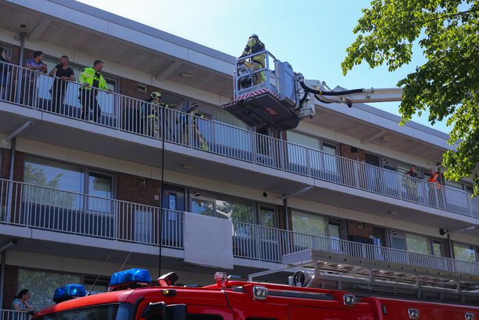 Brand op derde verdieping in flatwoning