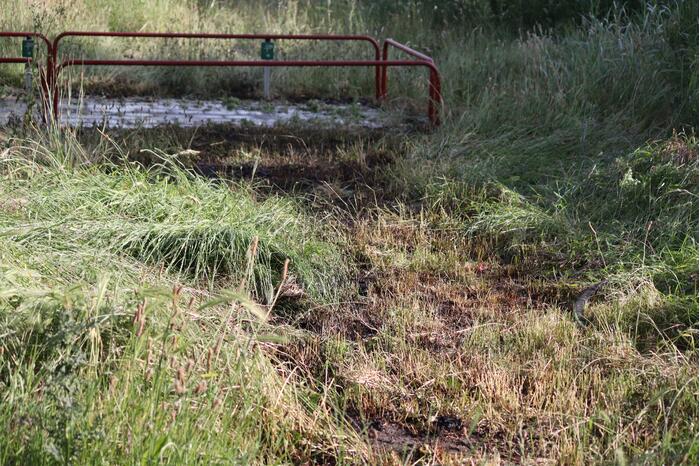 Brandweer blust bermbrand