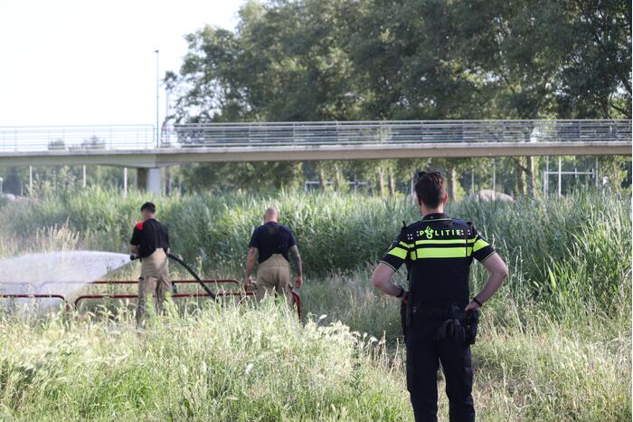 Brandweer blust bermbrand