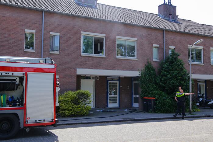 Deur woning opengeramd bij brand in woning