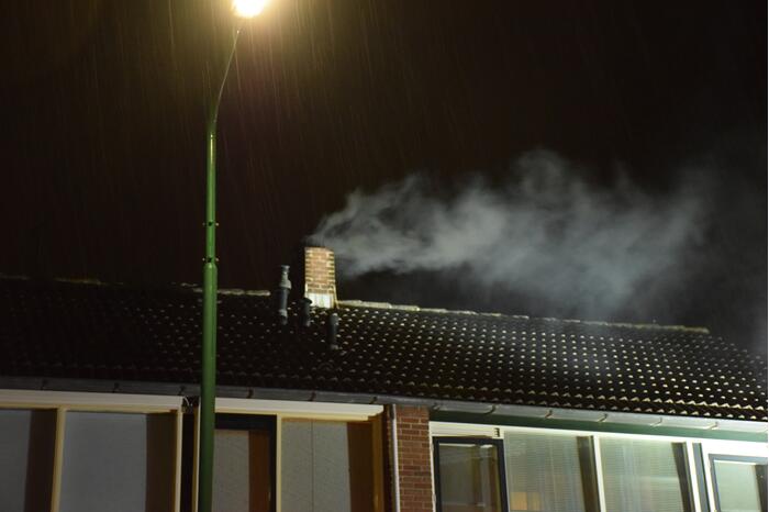 Forse vlammen bij schoorsteenbrand