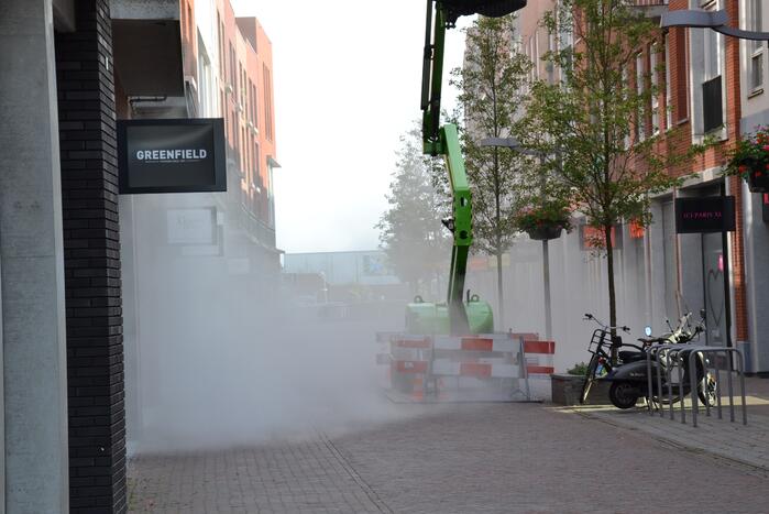 Winkel vol rook door mistgenerator