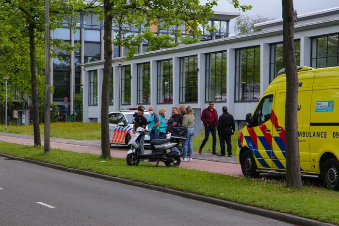 Maaltijdbezorger in aanrijding met bestelwagen