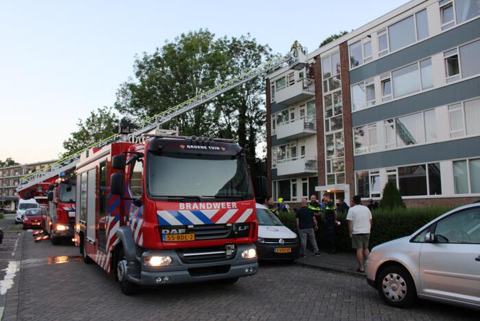 Flat deels ontruimd door brandlucht