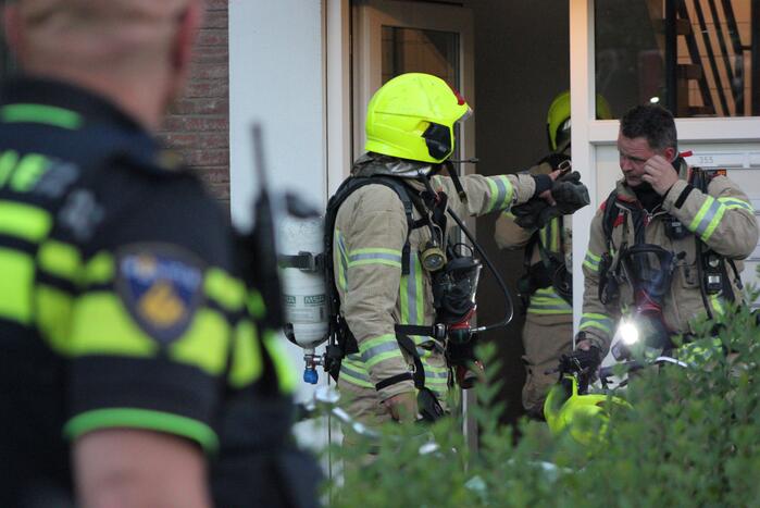 Flat deels ontruimd door brandlucht