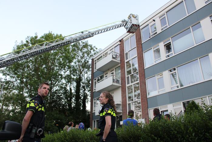 Flat deels ontruimd door brandlucht