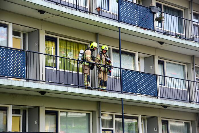 Bank in kelderruimte in brand gevlogen
