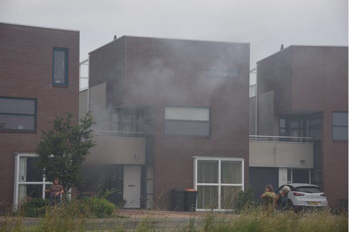 Veel rook bij brand in wasdroger