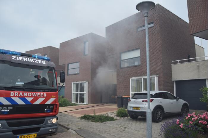 Veel rook bij brand in wasdroger