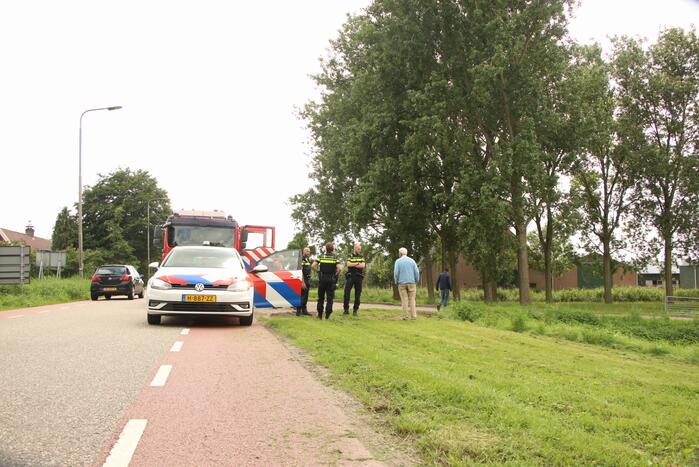 Zitmaaier gekanteld en belandt op slootrand