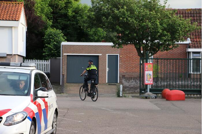 Fietser gewond na ongeval met auto op parkeerplaats