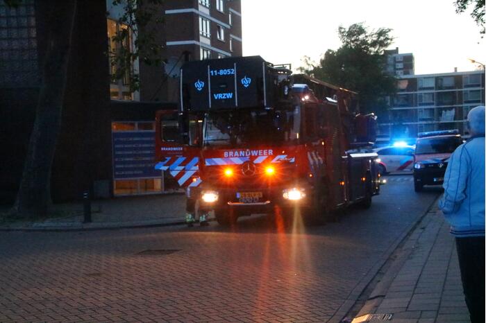 Brand in keuken van flatwoning