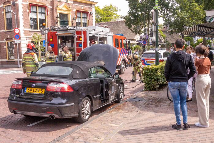 Motorcompartiment auto vat vlam