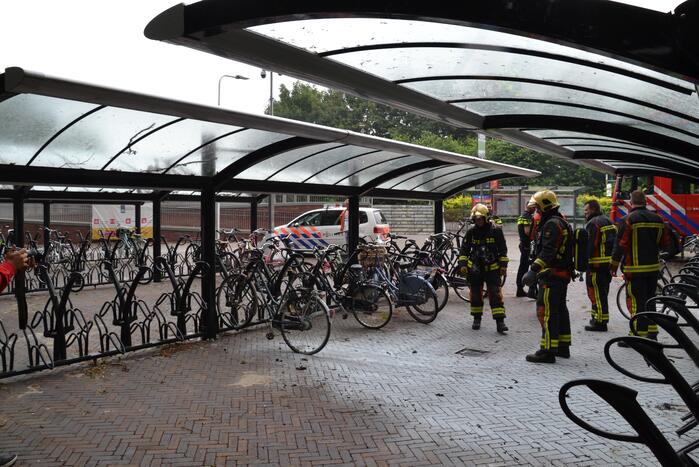 Fiets in brand in fietsenstalling