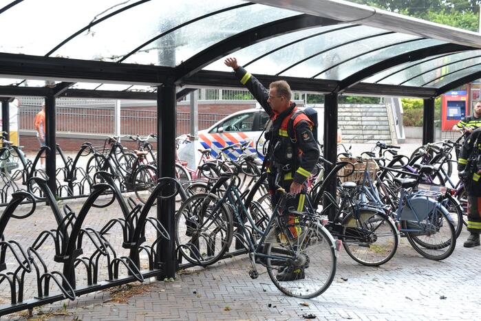 Fiets in brand in fietsenstalling