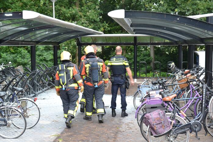 Fiets in brand in fietsenstalling