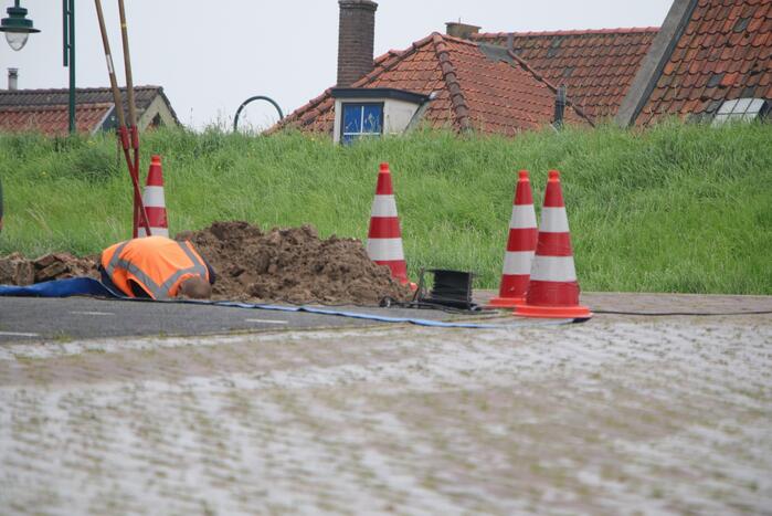 Parkeerplaats opengebroken door waterlekkage