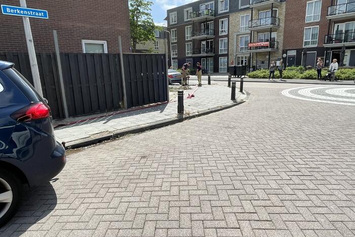 Schutting in achtertuin beschadigd door brand