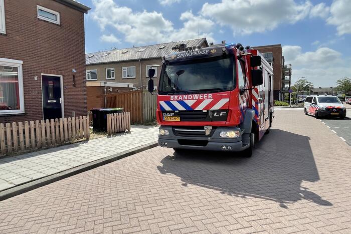 Schutting in achtertuin beschadigd door brand