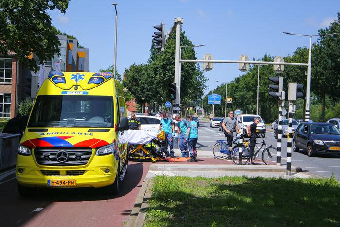 Scooterrijders botsen op fietspad
