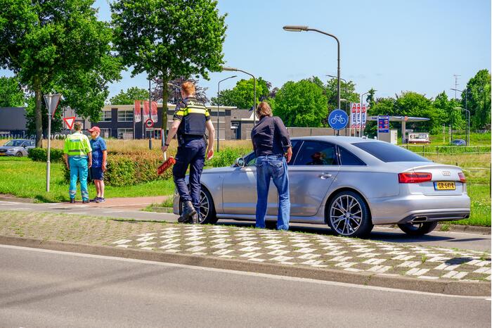 Flinke file door aanrijding met fietser