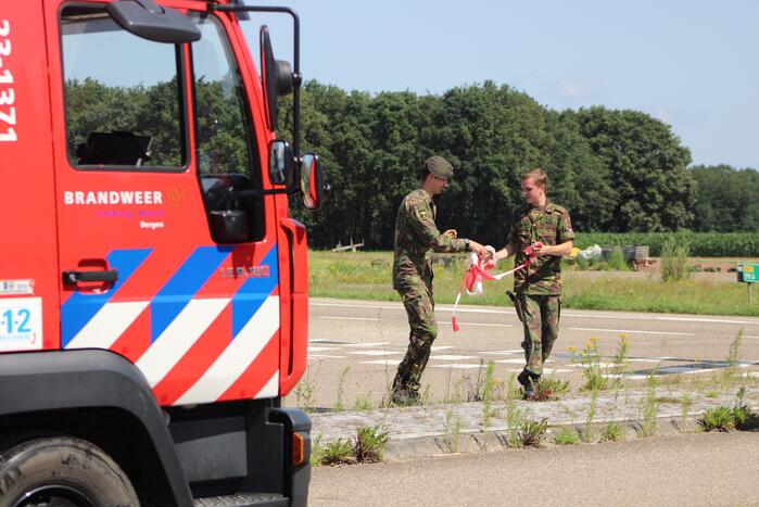 Persoon te water bij overstromingen