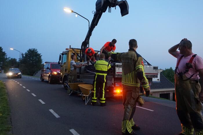Brandweer helpt bij overstroming in woningen