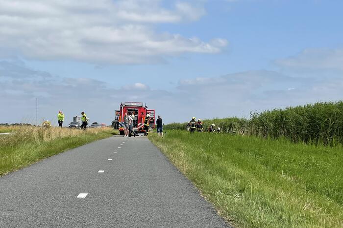 Auto's belanden in sloot