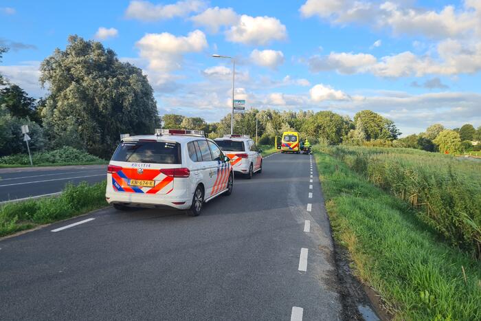 Persoon ten val met scooter