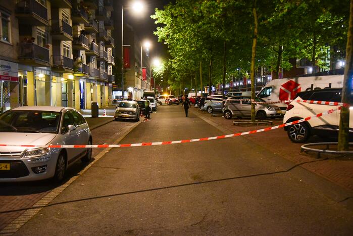 Schoten gelost op woning en winkelpand