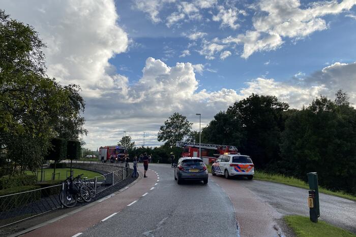 Rook uit schoorsteen van woning