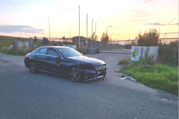 Twee opzittenden van scooter gewond bij aanrijding